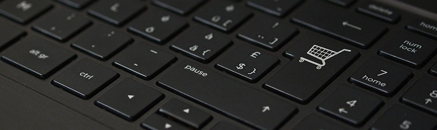 E-Commerce, Computer-Tastatur mit Warenkorb-Icon